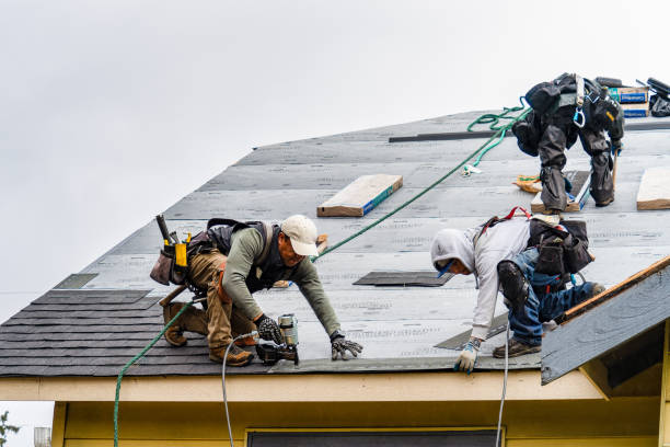 Professional Gutter Installation technician working in Los Banos, CA